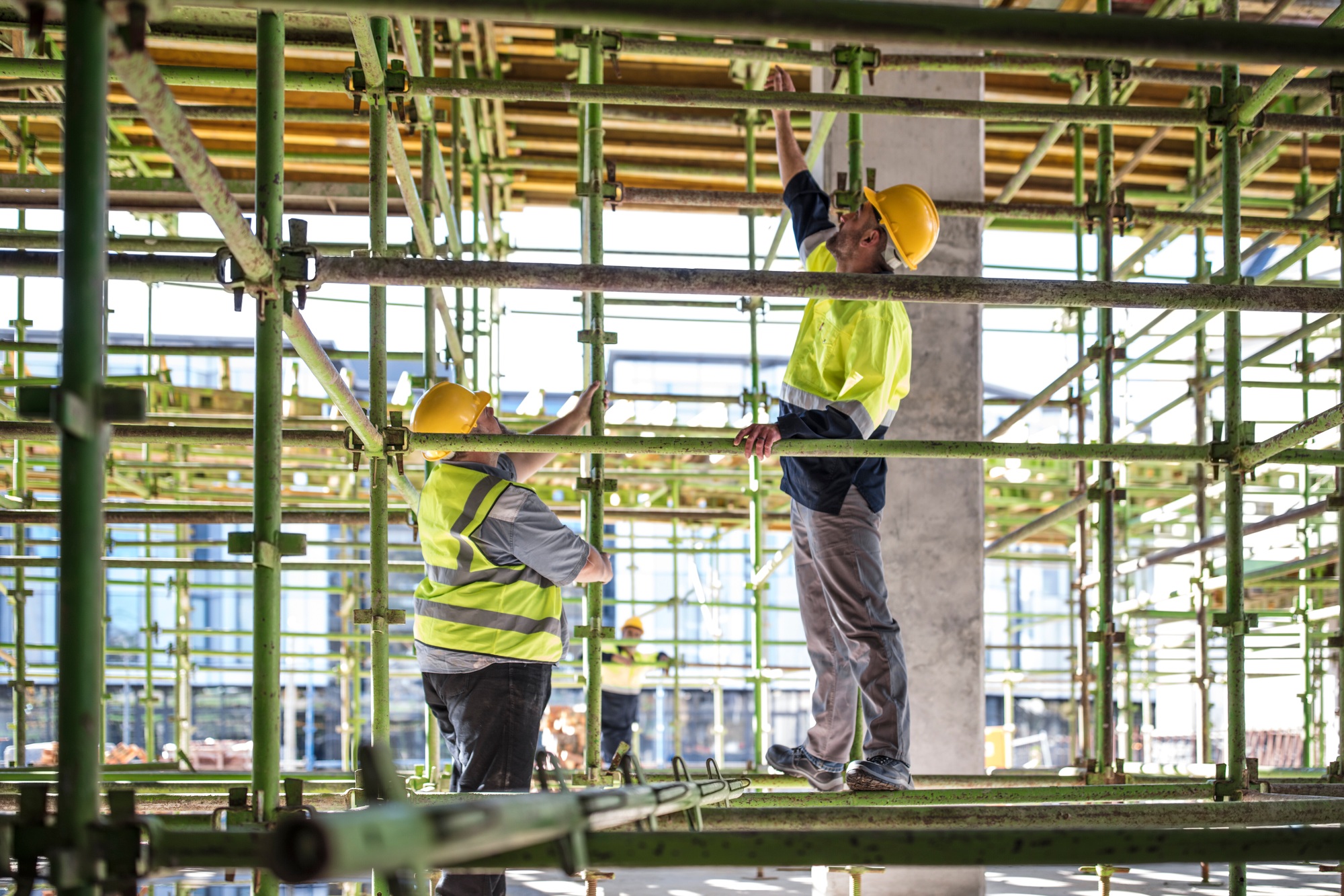 Construction workers on scaffolding