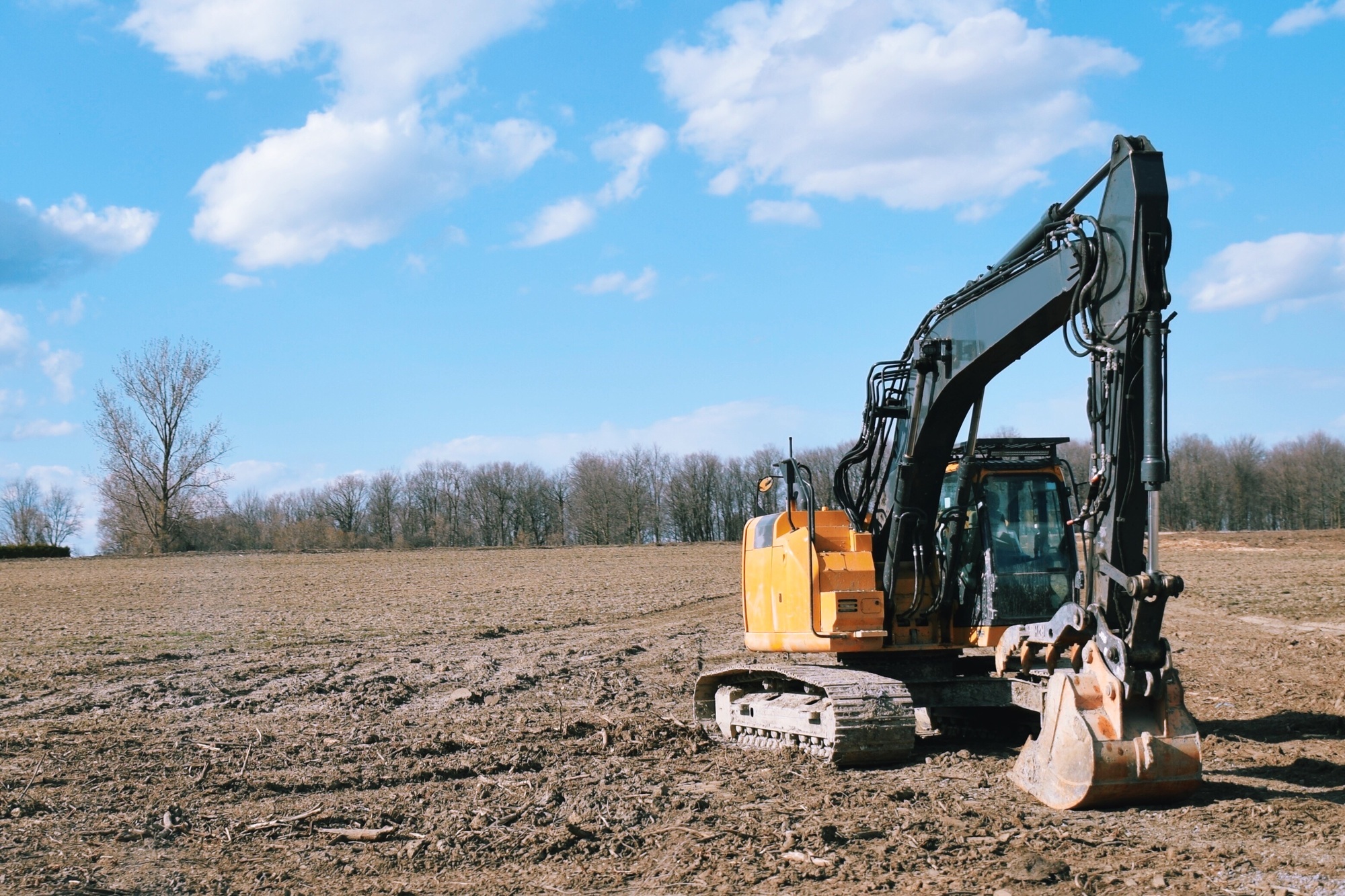 Excavator on an empty field